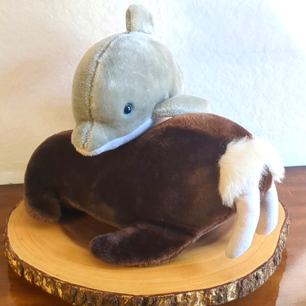 Vintage Sea World Stuffed animals. Walrus and Dolphin